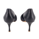 Navy leather stiletto heels with slender heels and curved counter