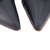 Navy leather pointed-toe heel close-up of smooth upper and seam