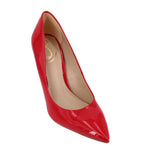 Red patent leather pointed-toe heels with a curved vamp and glossy finish