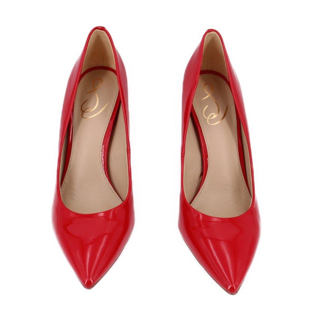 Pair of red patent leather pointed-toe pumps with beige insole