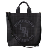 Burberry logo graphic tote crossbody bag in black, with top handles and shoulder strap