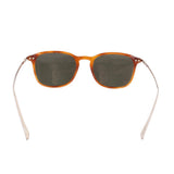 Tortoise sunglasses front view with dark lenses and metal temple studs