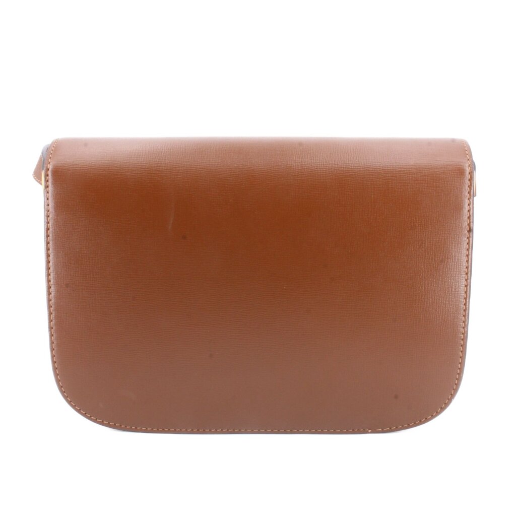 Brown leather shoulder bag back panel with stitched edges.