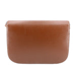 Brown leather shoulder bag back panel with stitched edges.
