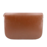 Brown leather shoulder bag back panel with stitched edges.
