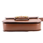 Brown leather shoulder bag bottom view with gold Horsebit top hardware.