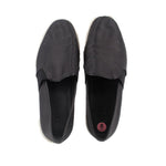 Black perforated flats, showing inside and size label on insole