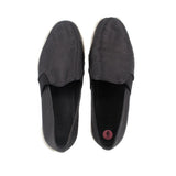 Black perforated flats, showing inside and size label on insole