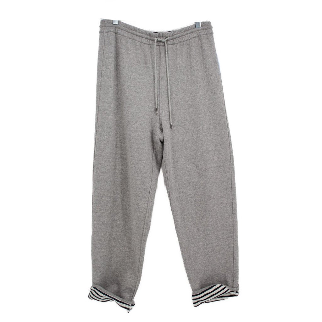 Gray sweatpants with drawstring and striped ribbed ankle cuffs