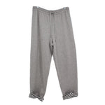 Gray sweatpants with drawstring and striped ribbed ankle cuffs