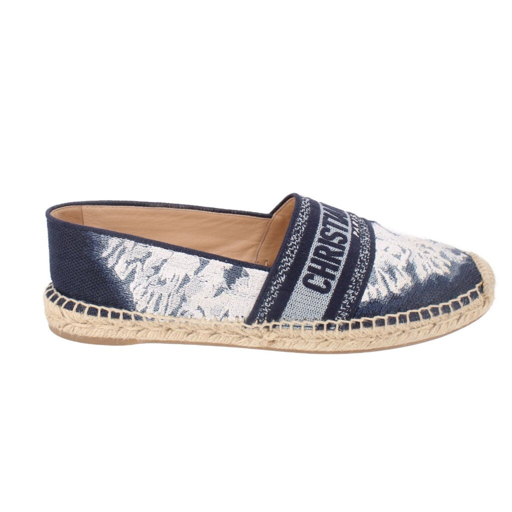 Blue espadrille flats with navy logo strap and canvas upper