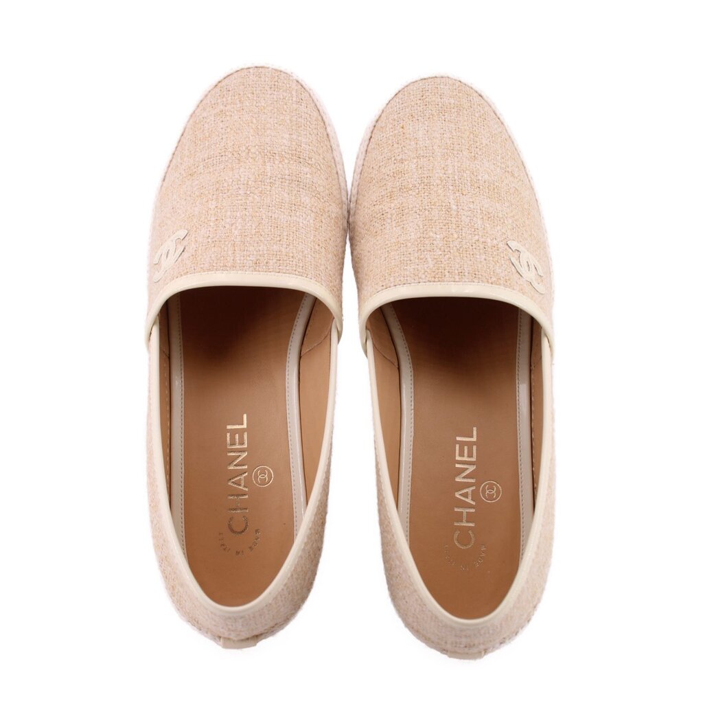 Cream CHANEL espadrille flat pair, showing open toes and logo-lined insole