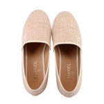 Cream CHANEL espadrille flat pair, showing open toes and logo-lined insole