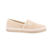 Cream CHANEL espadrille flat, side view, woven upper with CC logo detail