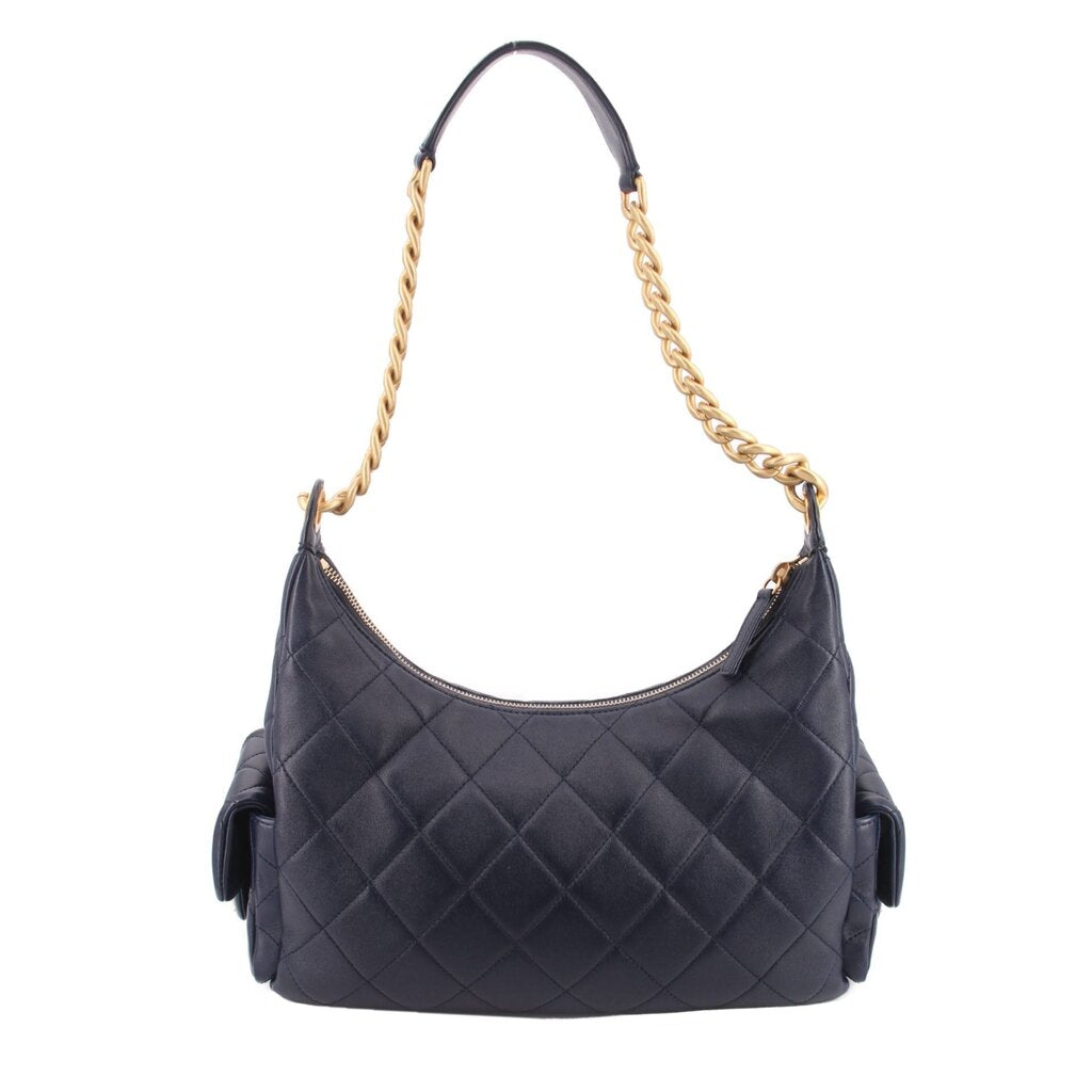 CHANEL large shoulder bag with dark navy quilted leather body and gold chain strap
