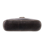 Black textured bag side view with tan piping and top zipper pull