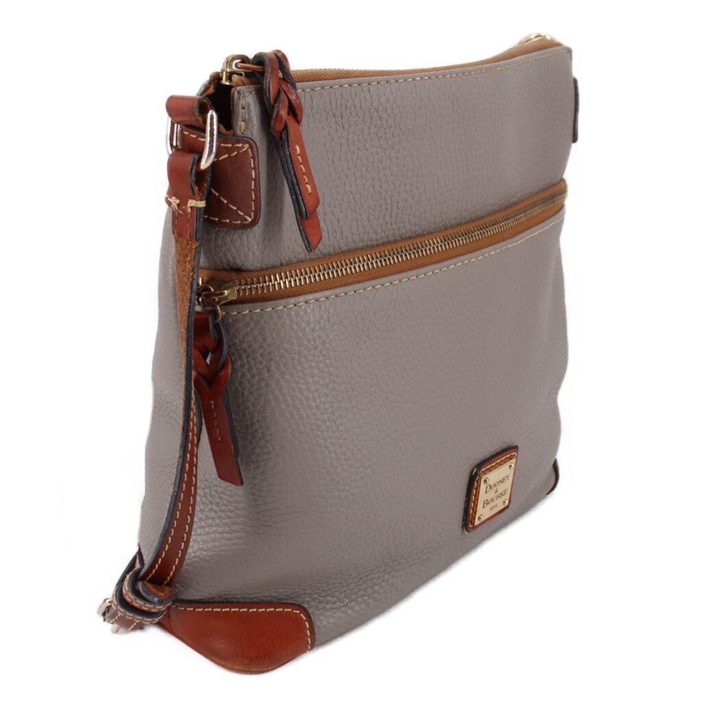 Taupe crossbody bag side view with top zip, brown accents, and braided strap