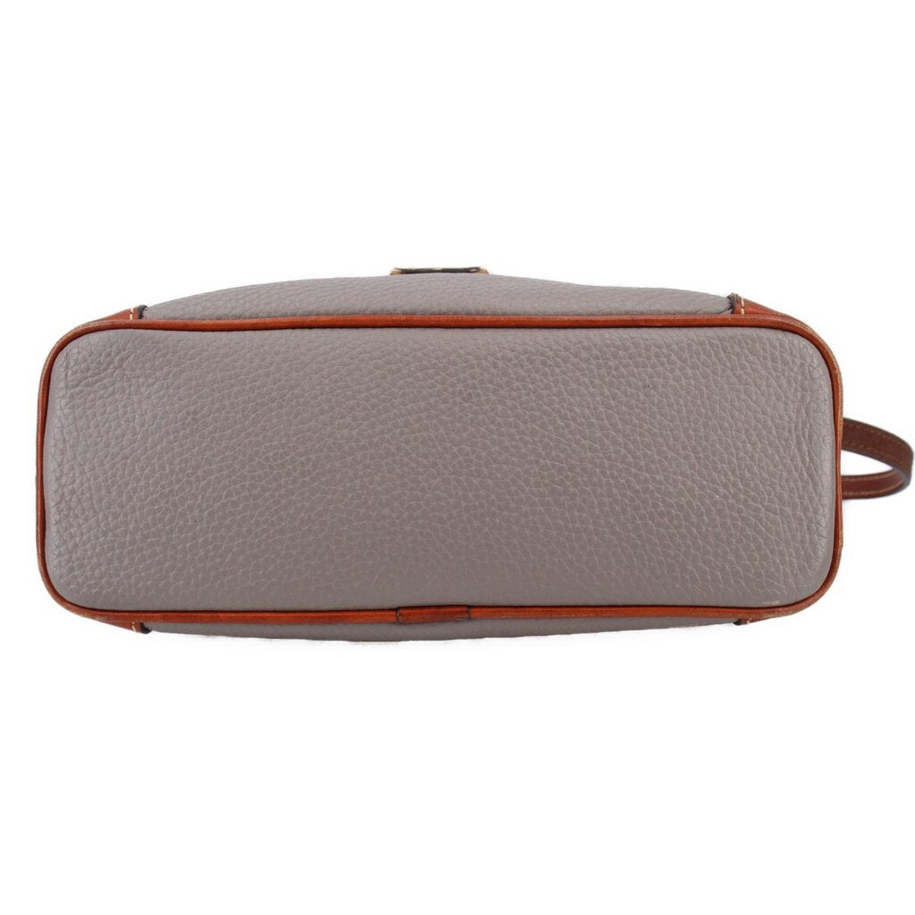 Taupe pebbled leather crossbody, front panel with top zip and brown-edged trim