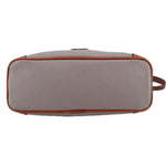 Taupe pebbled leather crossbody, front panel with top zip and brown-edged trim