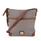 Taupe pebble-grain crossbody bag with zip, brown trim, and adjustable strap