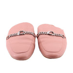 COACH pink mule loafers, top view with chain-link hardware at the instep