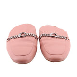COACH pink mule loafers, top view with chain-link hardware at the instep