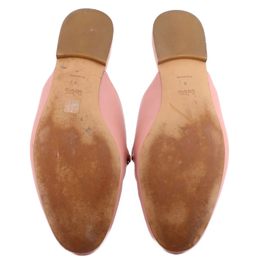 COACH pink mule loafers, outsole view with tan leather bottom and heel tread
