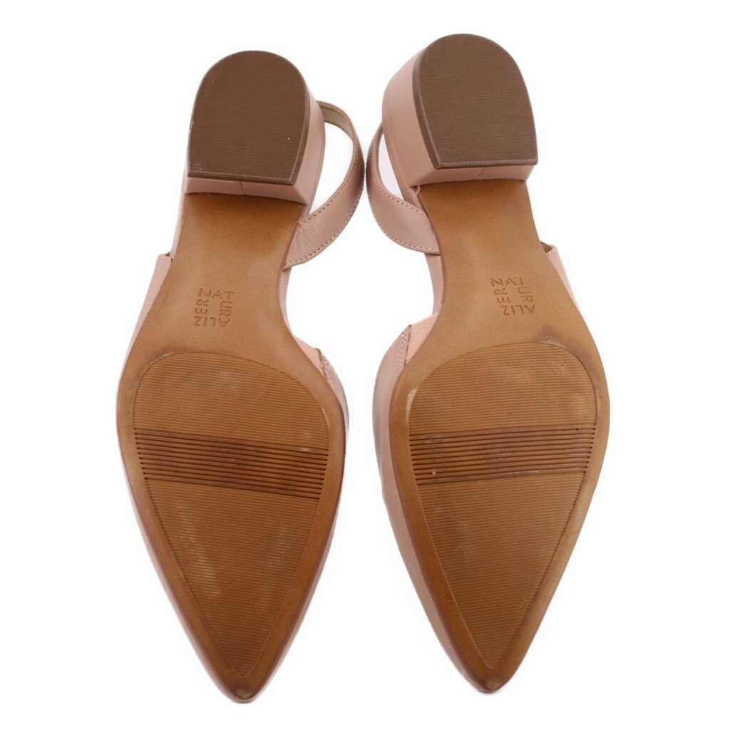 Nude slingback heels outsole view with textured tread and heel block