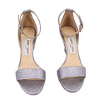 Silver sparkle open-toe heeled sandals with ankle strap and buckle