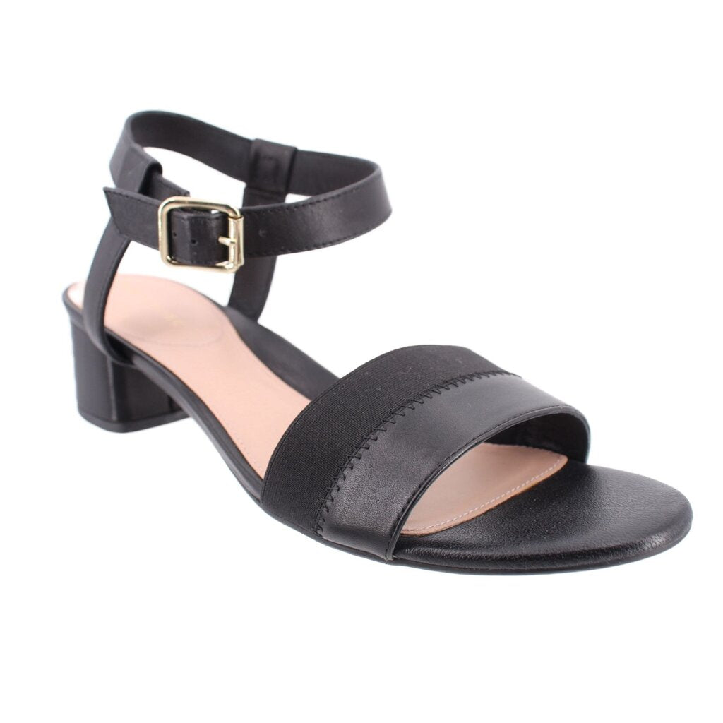 Black ankle-strap sandals with open toe, gold buckle, and block heel