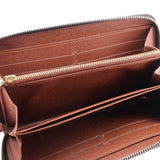 Zippy wallet interior with tan lining, card slots, and long zip opening track