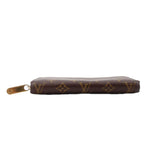 Brown Monogram Zippy wallet with gold-tone zipper pull and thin edge profile