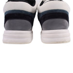 CHANEL suede trainer sneakers, back view with cushioned heel and white rubber sole