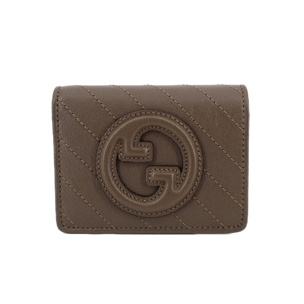 Olive leather Blondie wallet with Gucci G emblem and quilted diagonal stitching