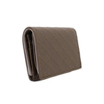 Olive leather Blondie wallet angled side view with quilted stitching and slim profile