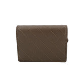 Olive leather Blondie wallet front with diagonal quilt panels and snap closure