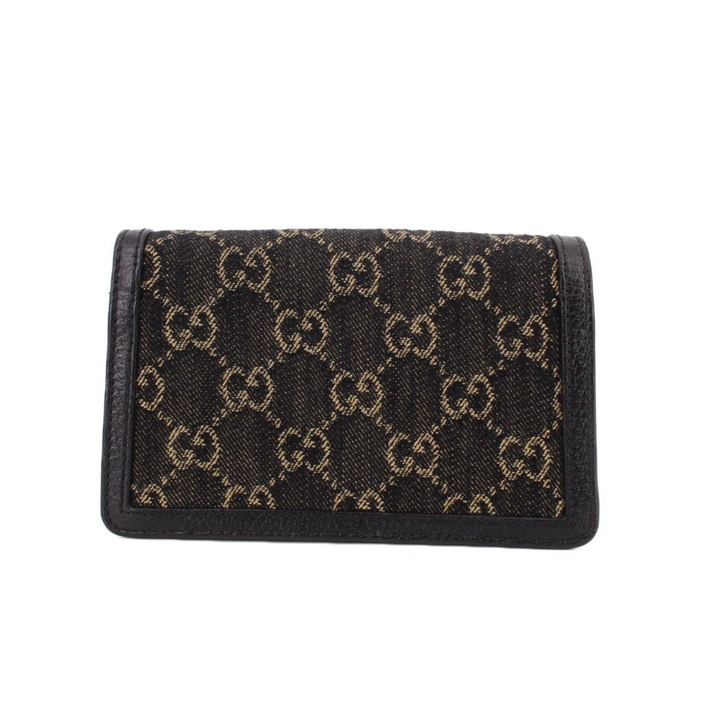 Dionysus mini crossbody flap, black denim GG monogram front