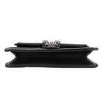 Dionysus mini crossbody, top view with chain strap and black leather base