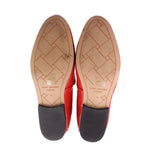 KURT GEIGER patent leather loafers, red soles with printed grip and branding