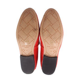 KURT GEIGER patent leather loafers, red soles with printed grip and branding