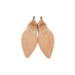 Tan suede pointed-toe heels, underside view showing smooth footbed