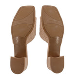 Tan woven slide sandals with textured outsole and MARC FISHER logo