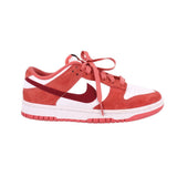 Women's red and white Nike Dunk Low sneakers with white Swoosh, lace-up