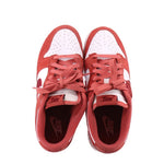 Women's Nike Dunk Low sneakers, red uppers with white toe panels, lace-up