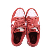 Women's Nike Dunk Low sneakers, red uppers with white toe panels, lace-up