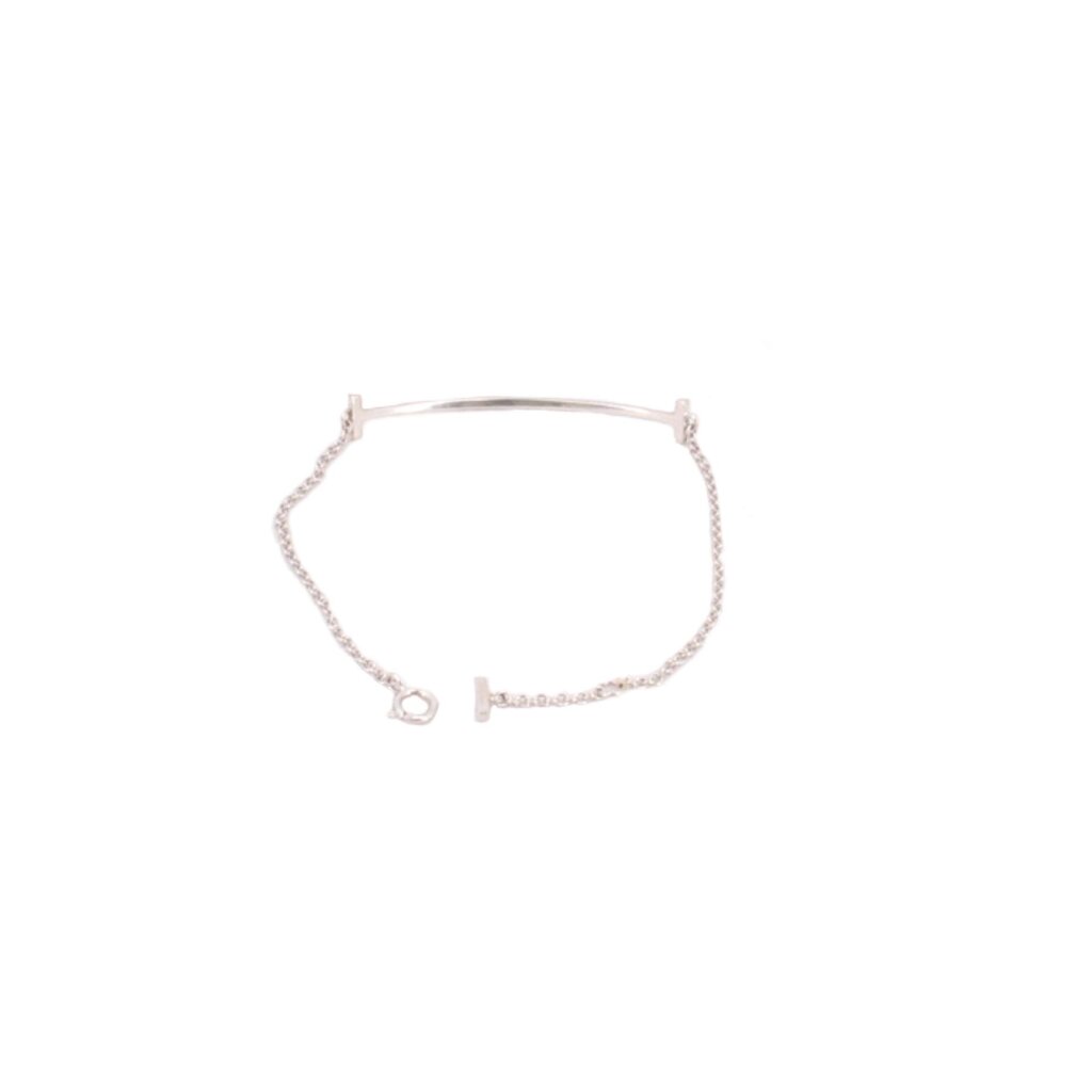White gold bracelet with adjustable link chain and smooth bar centerpiece