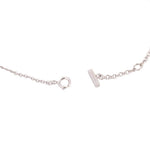 White gold bracelet clasp with round closure ring and side bar detail