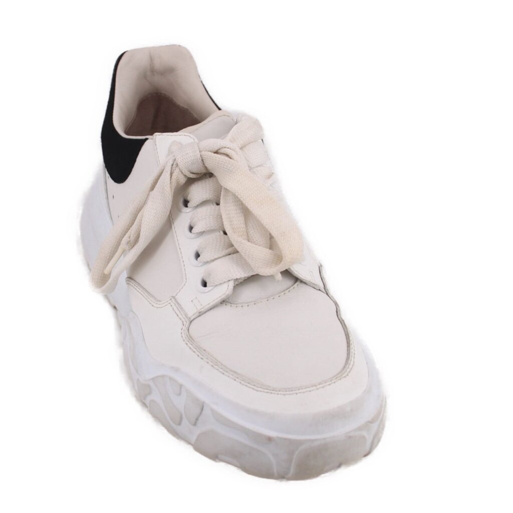 White women's oversized court trainer sneakers with lace-up front and chunky sole