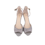 Pair of black-and-white striped heeled sandals with ankle ties and open toe