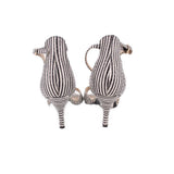 Back view of black-and-white striped heeled sandals with stiletto heel